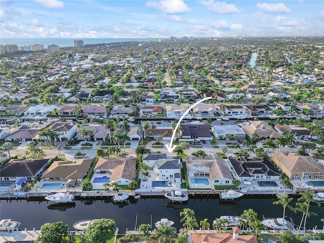 bird's eye view with a water view