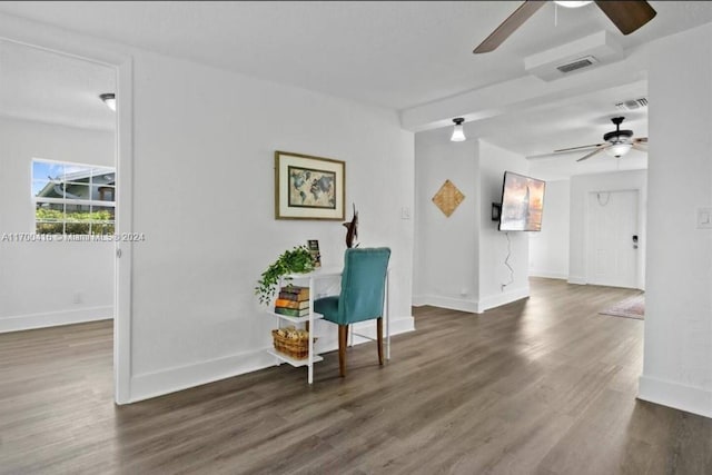 sitting room with dark hardwood / wood-style flooring