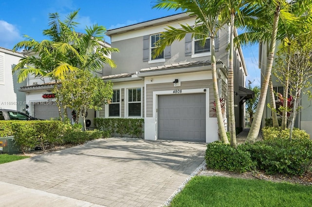 view of front of home with a garage