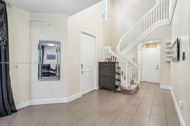 foyer with a high ceiling