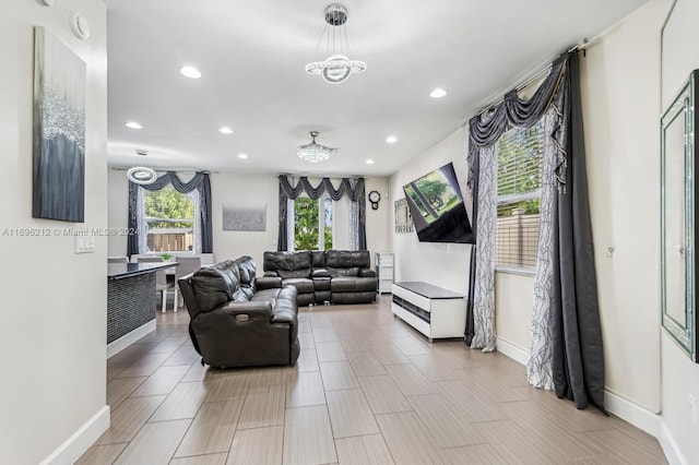 living room with a notable chandelier