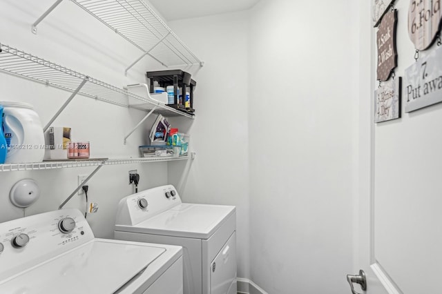 laundry room with washer and dryer