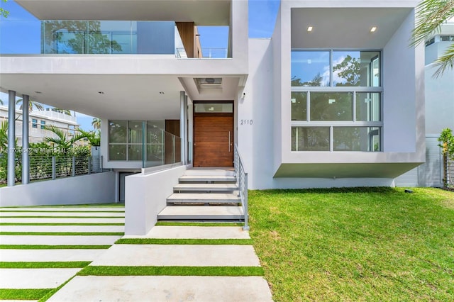 2110 S Miami Ave, Miami, FL 33129 - entrance to property featuring a lawn and stucco siding