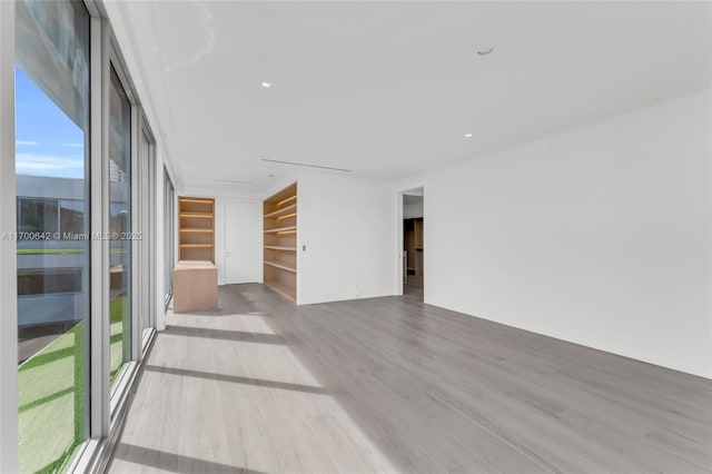 2110 S Miami Ave, Miami, FL 33129 - unfurnished room featuring recessed lighting, wood finished floors, and built in features