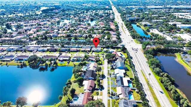 bird's eye view with a water view