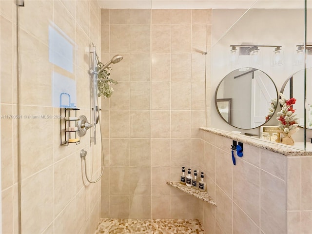 bathroom featuring a tile shower