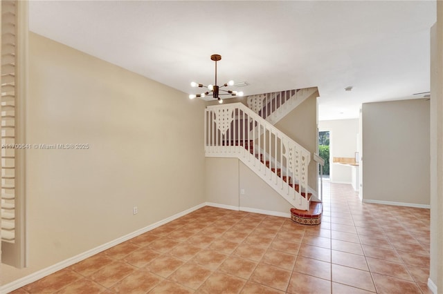 interior space featuring tile patterned flooring and a notable chandelier