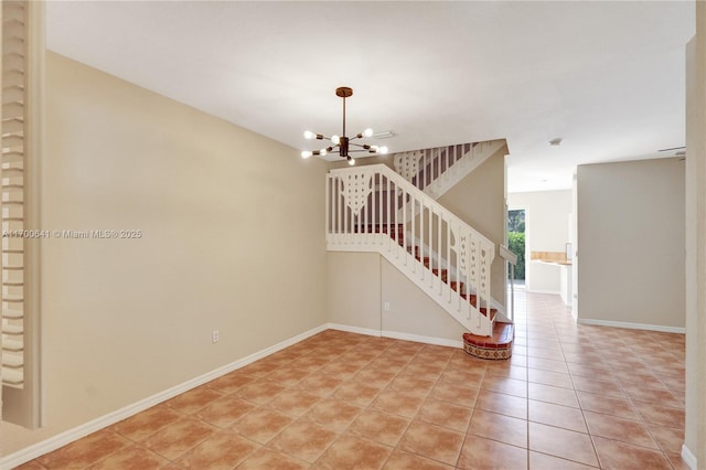 12564 SW 121st Way, Miami, FL 33186 - spare room with a chandelier, stairway, baseboards, and light tile patterned floors