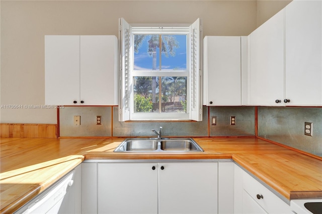 12564 SW 121st Way, Miami, FL 33186 - kitchen with a sink, white cabinets, plenty of natural light, and tasteful backsplash