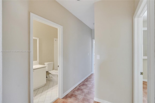 12564 SW 121st Way, Miami, FL 33186 - hall with light tile patterned floors and baseboards