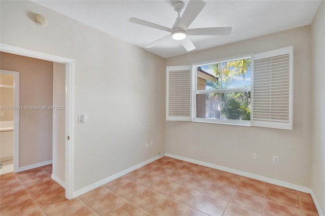 12564 SW 121st Way, Miami, FL 33186 - spare room featuring ceiling fan, a smoke detector, light tile patterned floors, and baseboards