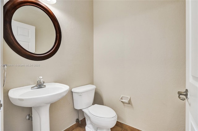 12564 SW 121st Way, Miami, FL 33186 - bathroom featuring toilet and baseboards