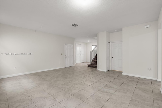 view of tiled spare room