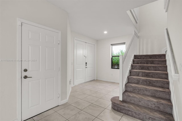 view of tiled foyer entrance