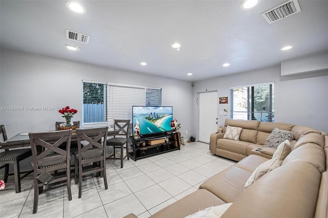 living room featuring light tile patterned floors