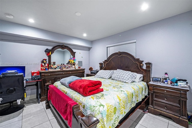 bedroom featuring light tile patterned floors