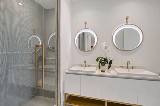 bathroom with vanity and an enclosed shower