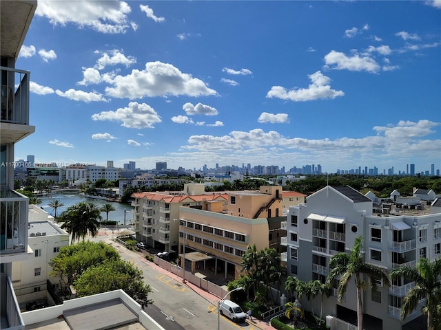 property's view of city with a water view