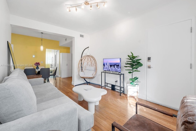 living room with hardwood / wood-style flooring