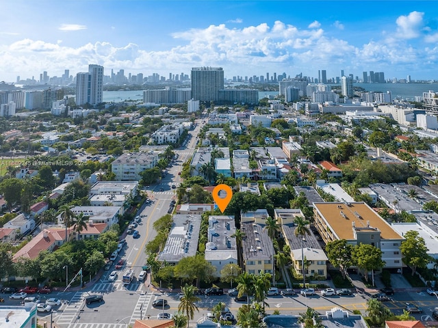 birds eye view of property with a city view