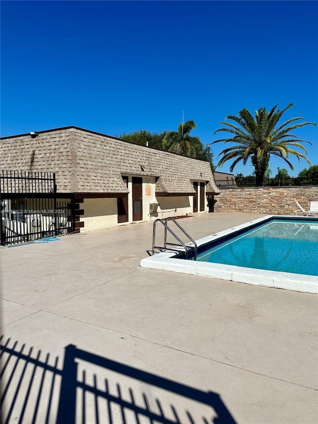 view of pool with a patio