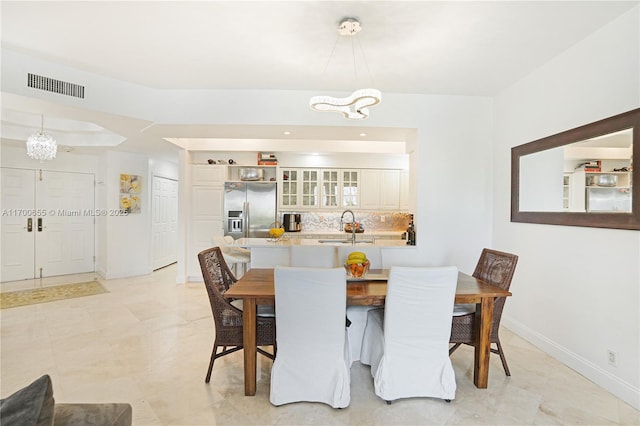 dining space with sink