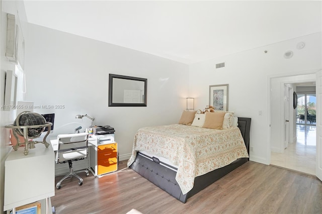 bedroom featuring hardwood / wood-style flooring