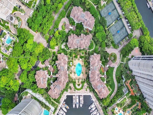 birds eye view of property with a water view