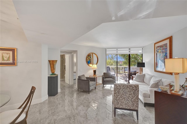 living room featuring expansive windows