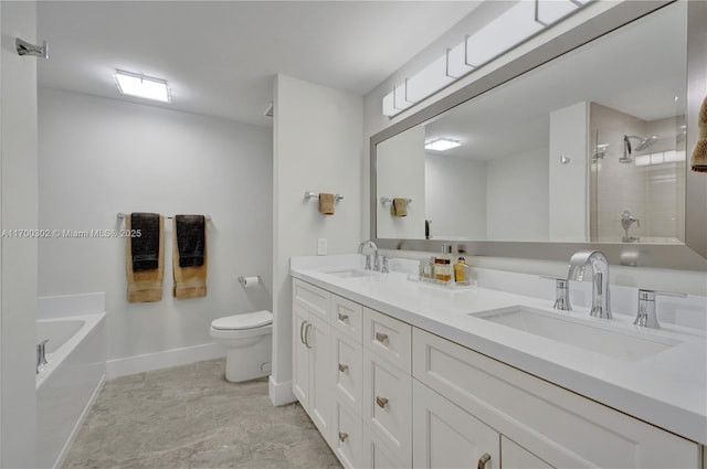 full bathroom with vanity, toilet, and separate shower and tub