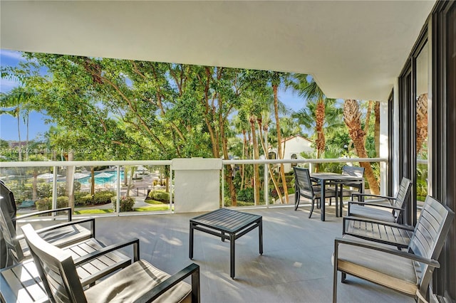 view of patio with a balcony