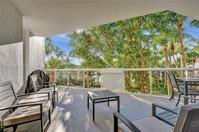 view of patio with a balcony