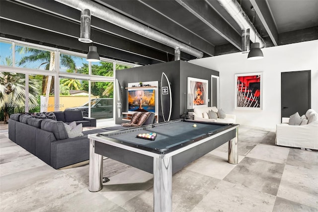 playroom with beam ceiling and billiards