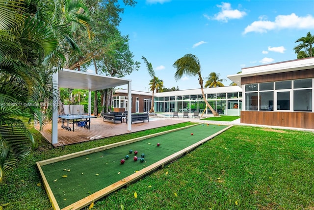 exterior space featuring a lawn, a patio area, and an outdoor hangout area