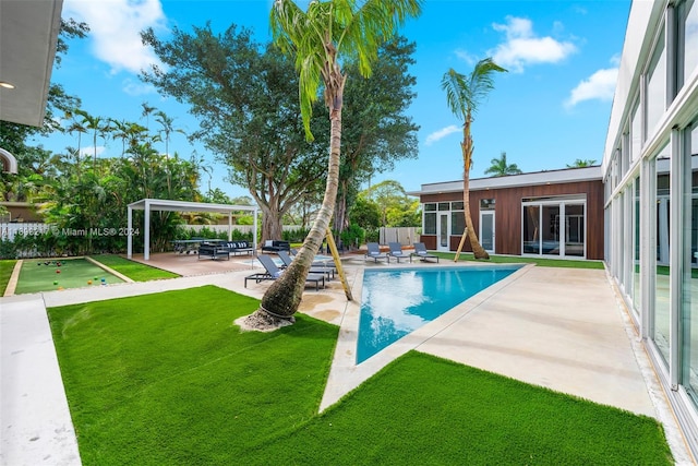 view of swimming pool featuring a patio area