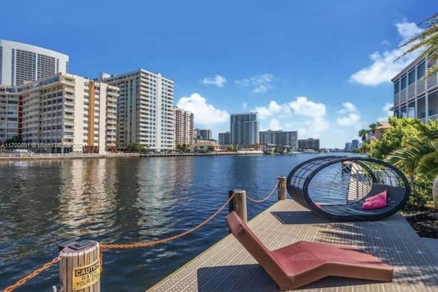 dock area featuring a water view