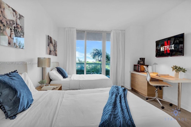 bedroom featuring hardwood / wood-style floors