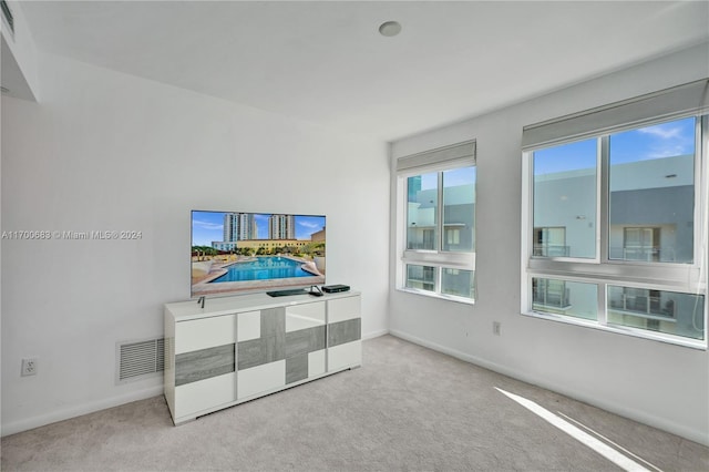 living room with light colored carpet