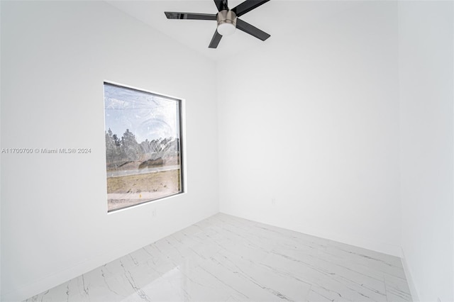 unfurnished room with ceiling fan