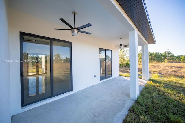 view of patio / terrace featuring ceiling fan