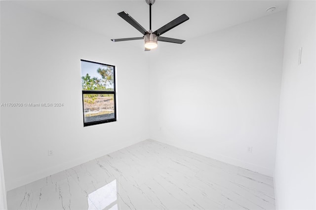 unfurnished room with ceiling fan