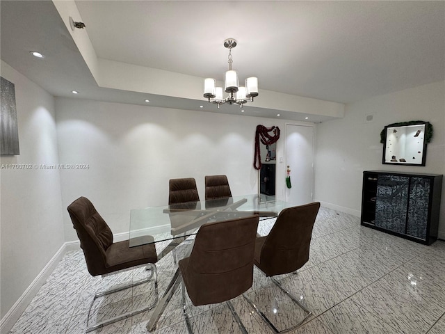 dining room featuring an inviting chandelier