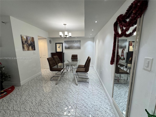 dining area featuring a chandelier