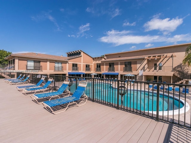 view of pool featuring a patio