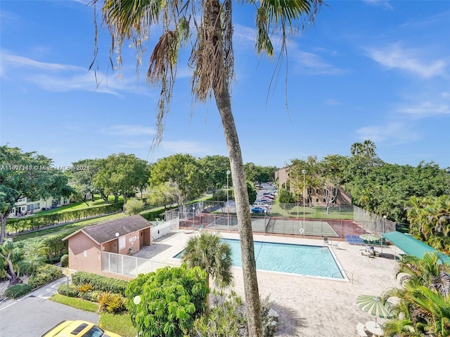 view of pool featuring a patio area