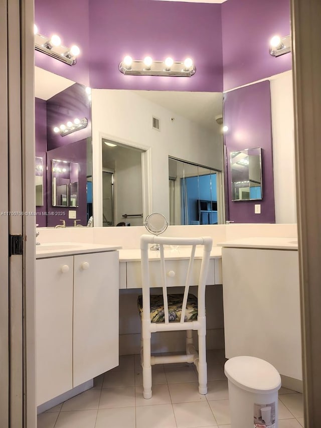 bathroom with vanity and tile patterned floors