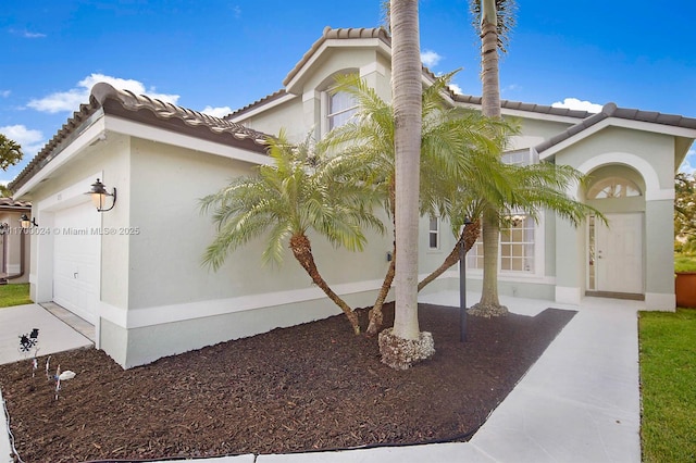 view of front of house with a garage