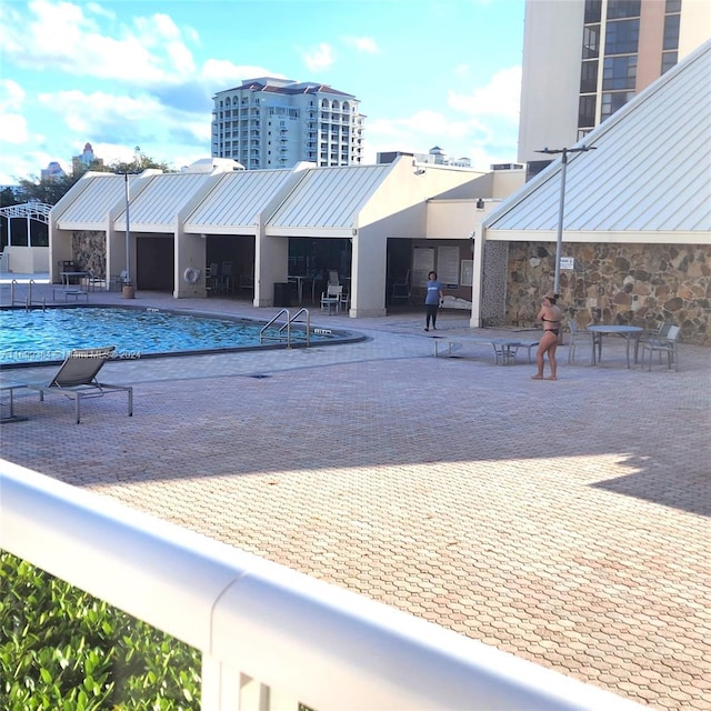 view of pool with a patio area