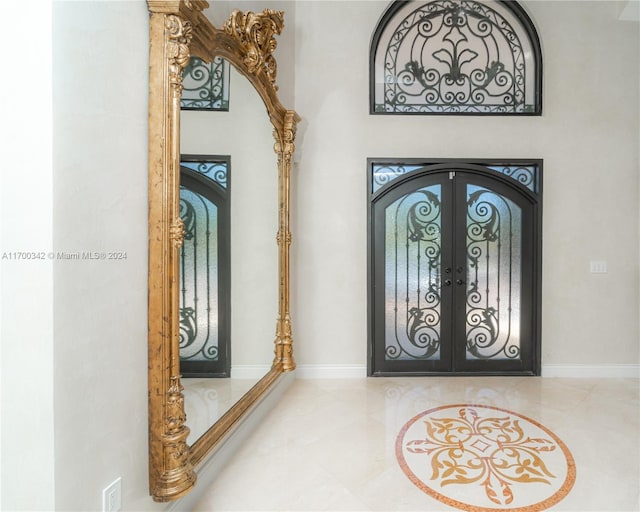 entryway featuring french doors