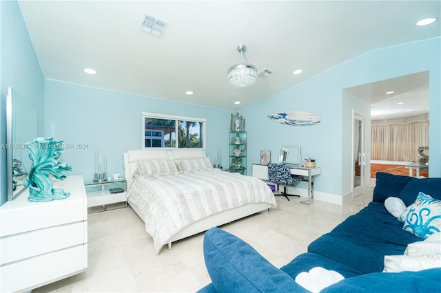 bedroom featuring lofted ceiling